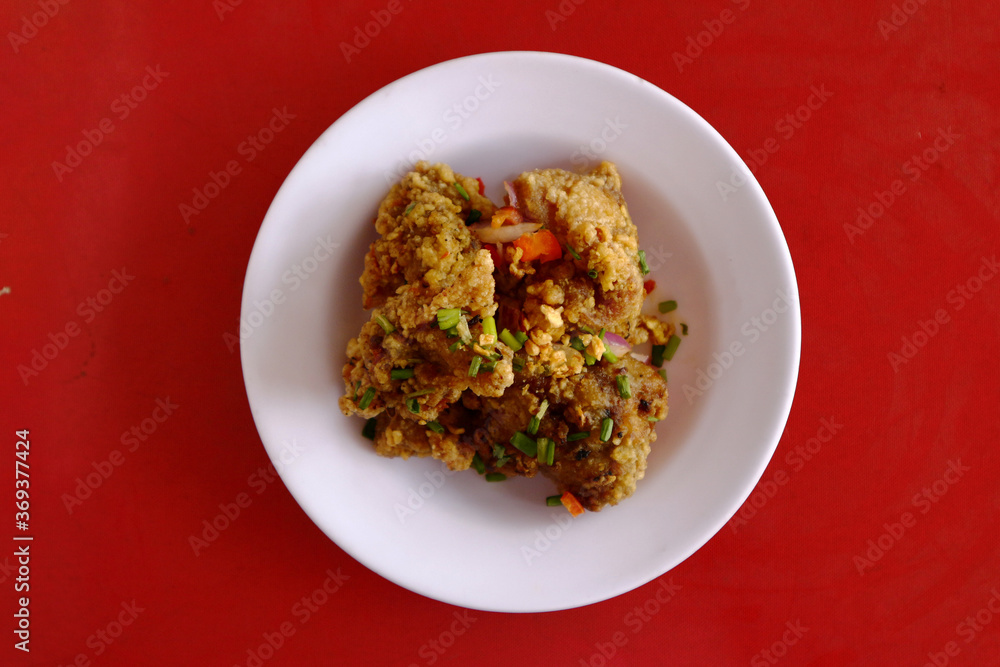 Freshly made crispy deep fried chicken on a plate Freshly made crispy deep fried chicken on a plate