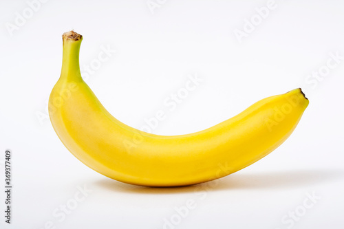 Single banana against white background 
