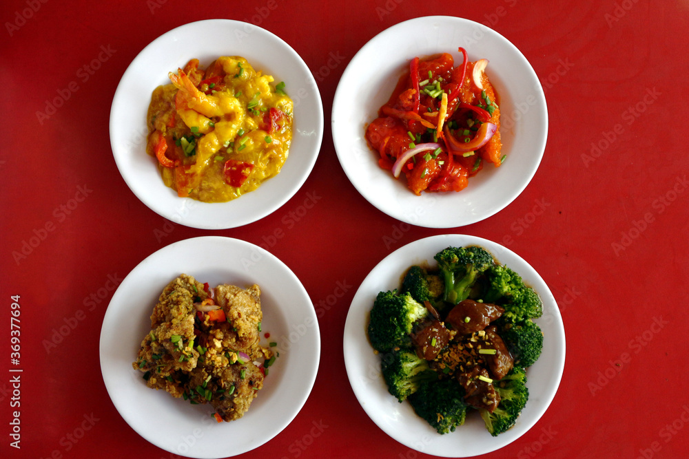 Freshly made Chinese and Filipino dishes on a table Freshly made Chinese and Filipino dishes on a table