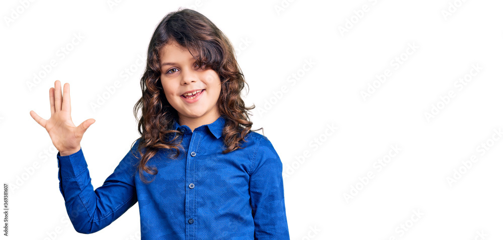 Cute child with long hair wearing casual clothes showing and pointing up with fingers number five while smiling confident and happy. Cute child with long hair wearing casual clothes showing and pointing up with fingers number five while smiling confident and happy.