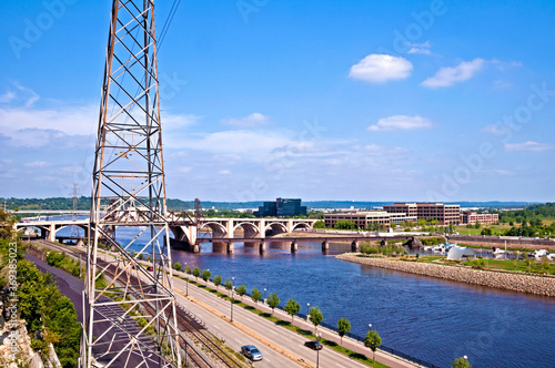 Shepard Road which is known as Ramsey County Highway 37 runs along the Mississippi River downtown St. Paul. Robert Street bridge is in the background.