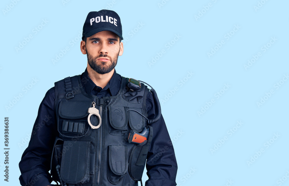 Young handsome man with beard wearing police uniform skeptic and nervous, frowning upset because of problem. negative person. Young handsome man with beard wearing police uniform skeptic and nervous, frowning upset because of problem. negative person.