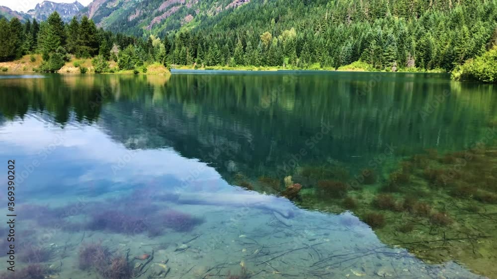 Crystal clear water in mountain lake in Cascades Crystal clear water in mountain lake in Cascades
