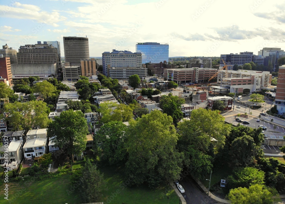 Fototapeta premium The aerial view of the downtown buildings and residential areas near Wilmington, Delaware, U.S.A