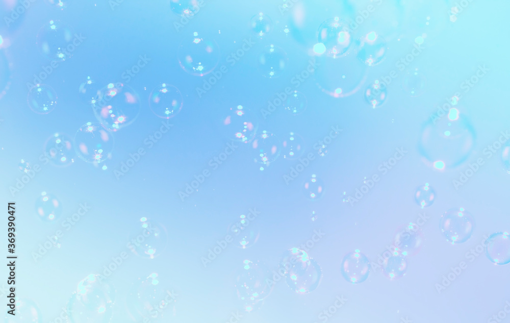 Beautiful gradient colors blue background with soap bubbles float in the air.