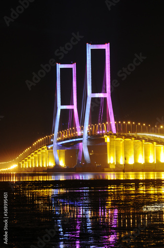 Night light, Suramadu bridge in Indonesia connects Java Island and Madura Island in Surabaya, East Java, Indonesia