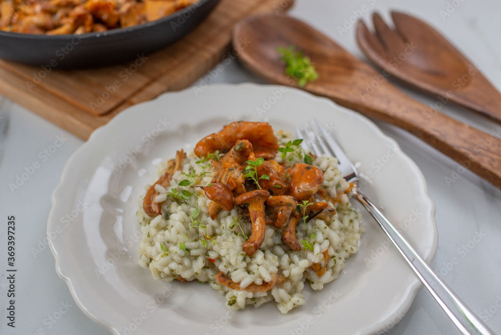 home made Risotto with chanterelle mushrooms and herbs home made Risotto with chanterelle mushrooms and herbs