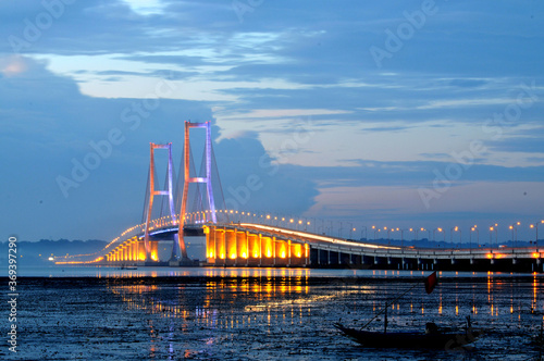 Beautiful scenery before the sun sets on the Suramadu bridge connecting Java Island and Madura Island in Surabaya, East Java, Indonesia
