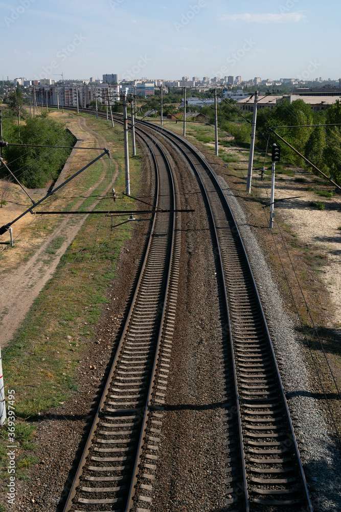 Unguarded railway crossing in a rural landscape Unguarded railway crossing in a rural landscape