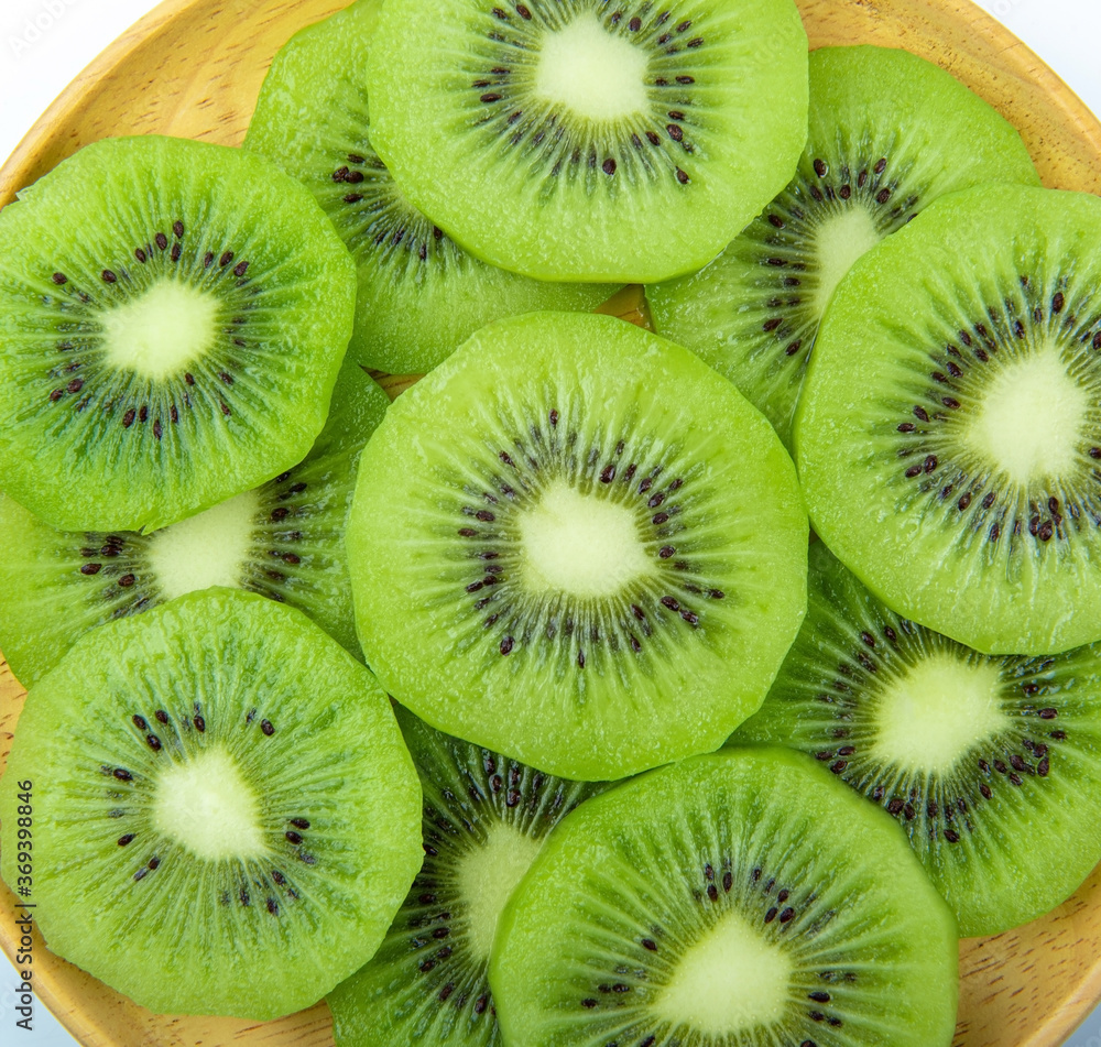 Slice of kiwi fruit isolated on white background Slice of kiwi fruit isolated on white background