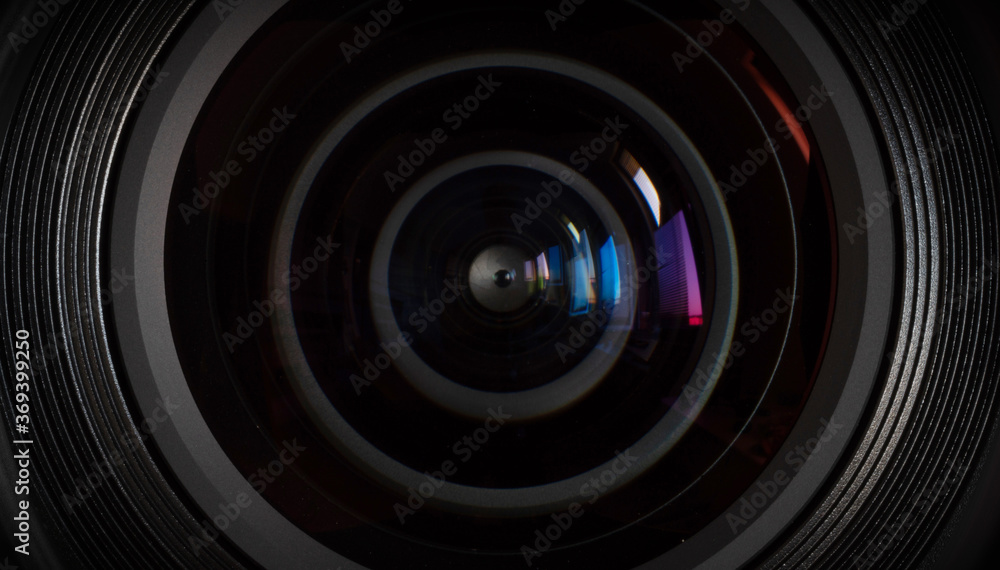 Close-up camera lens with color reflections - obrazy, fototapety, plakaty 