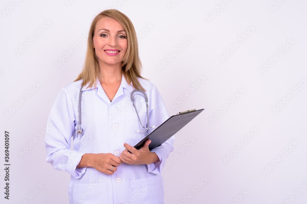Portrait of happy beautiful woman doctor with blond hair Portrait of happy beautiful woman doctor with blond hair