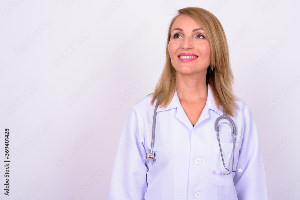 Portrait of happy beautiful woman doctor with blond hair Portrait of happy beautiful woman doctor with blond hair