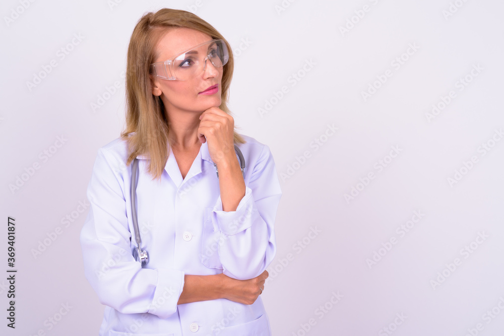 Portrait of beautiful blonde woman doctor as scientist Portrait of beautiful blonde woman doctor as scientist