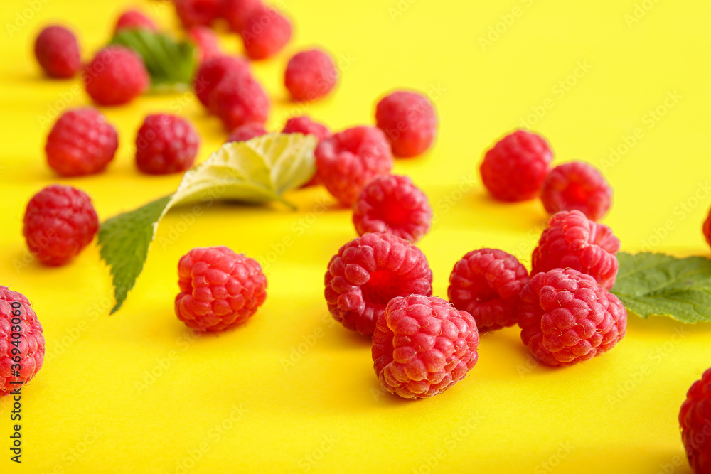 Tasty ripe raspberries on color background Tasty ripe raspberries on color background