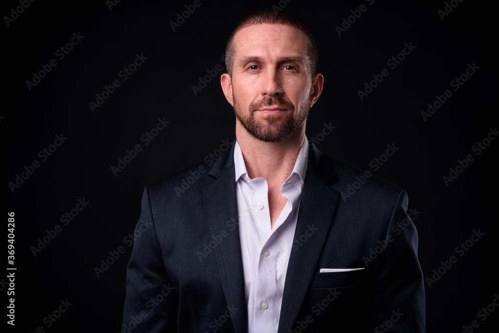 Portrait of handsome bearded businessman in suit Portrait of handsome bearded businessman in suit