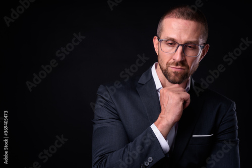 Portrait of handsome bearded businessman with eyeglasses