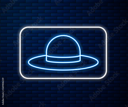 Glowing neon line Elegant women hat icon isolated on brick wall background. Vector Illustration.