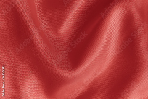 Rose gold fabric cloth texture for background and design art work, beautiful crumpled pattern of silk or linen.