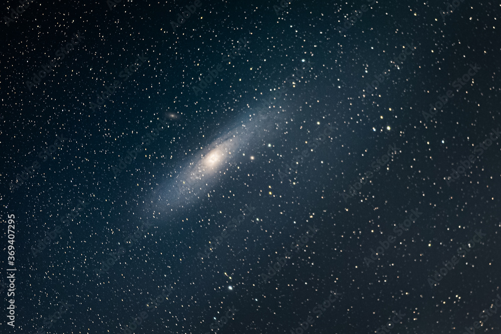 Naklejka space background with stars of the andromeda galaxy