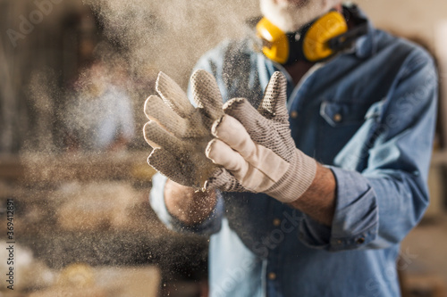 Obraz na plátně Close up of dusty work gloves