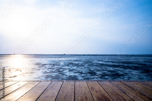 The wood floor extends into the sea when the water drops