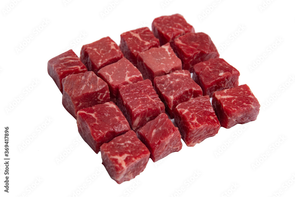 Raw beef cubes in white background
