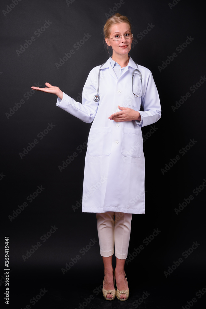 Portrait of beautiful woman doctor with blond hair Portrait of beautiful woman doctor with blond hair