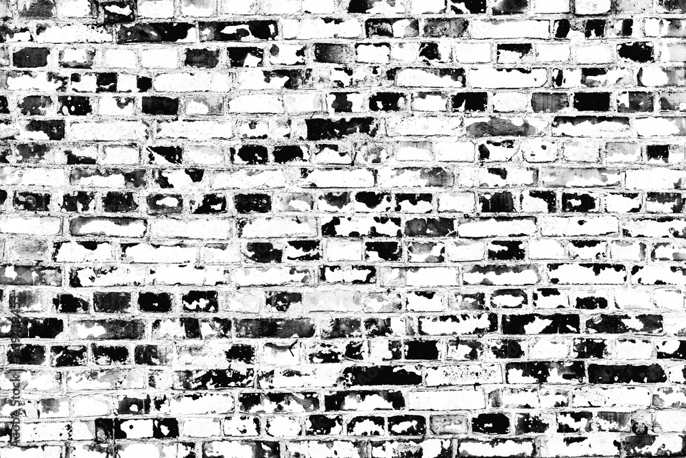 Fototapeta premium Texture of a brick wall with cracks and scratches which can be used as a background