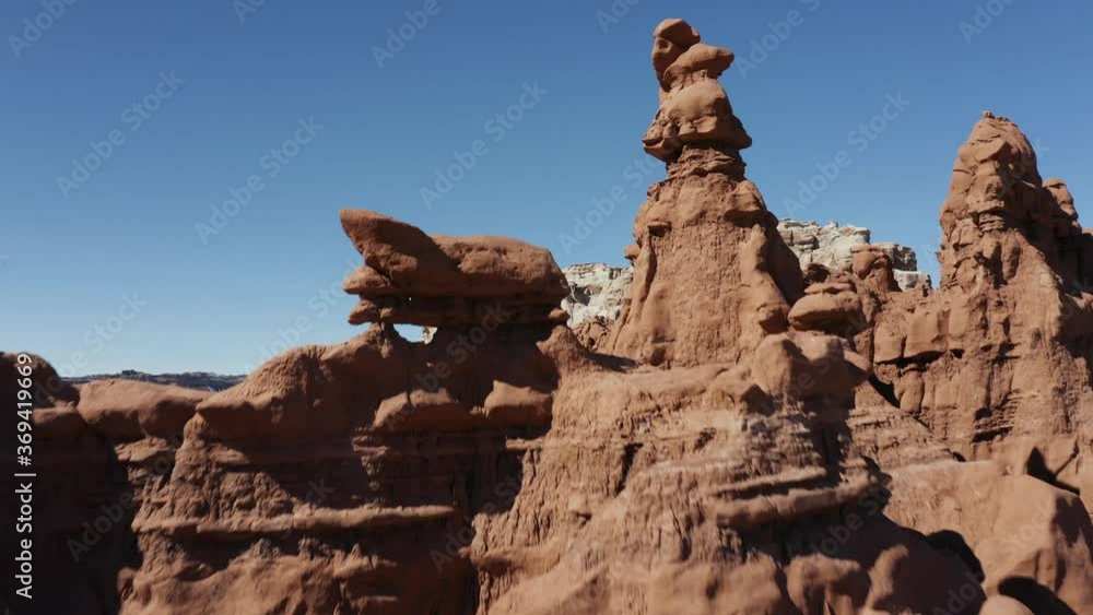 Aerial fly over southern Utah hoodoo rock formations in Goblin Valley State Park. Aerial fly over southern Utah hoodoo rock formations in Goblin Valley State Park.