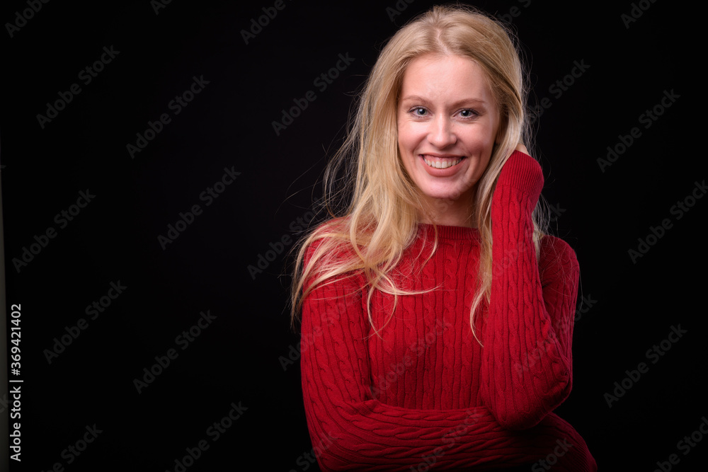 Portrait of happy beautiful woman with blond hair ready for winter Portrait of happy beautiful woman with blond hair ready for winter
