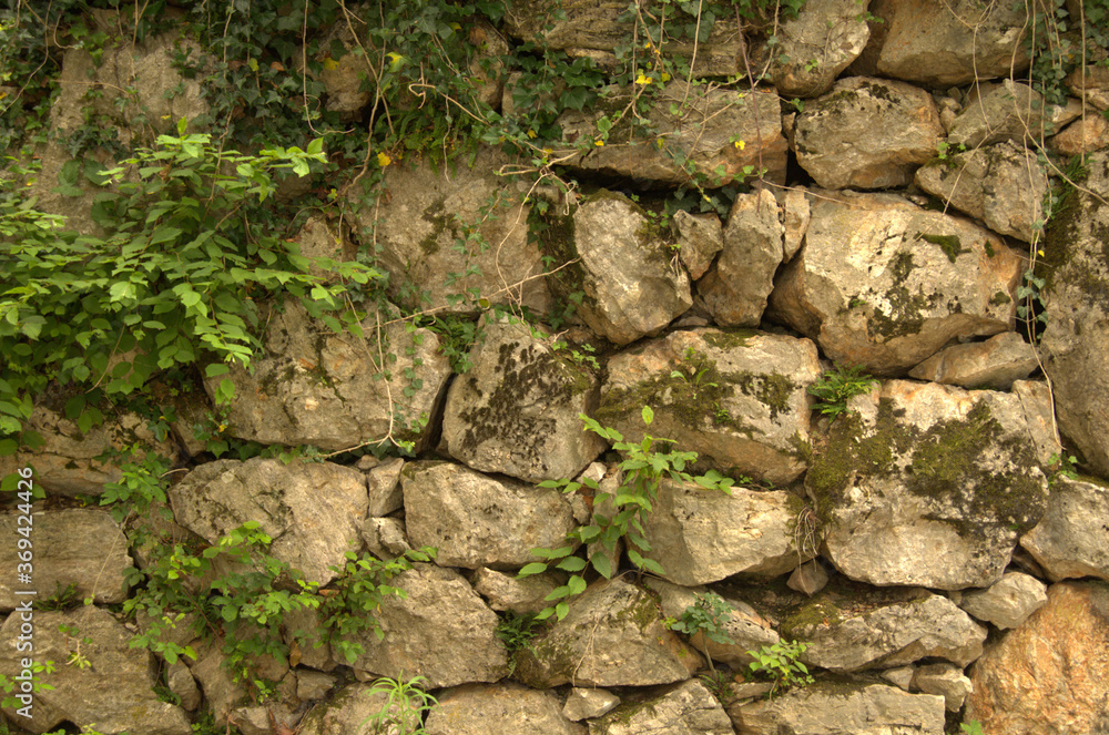 Vecchio muro in pietra di epoca medioevale. Vecchio muro in pietra di epoca medioevale.