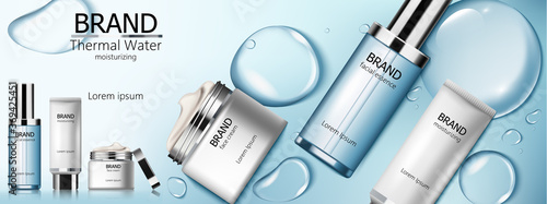 Set of thermal water cosmetic with facial essence, moisturizer and cream. Blue bubbles background