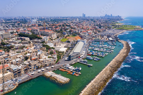 Aerial view of Jaffa old city port with marina coastline and general view of both Jaffa and Tel Aviv.
 photo