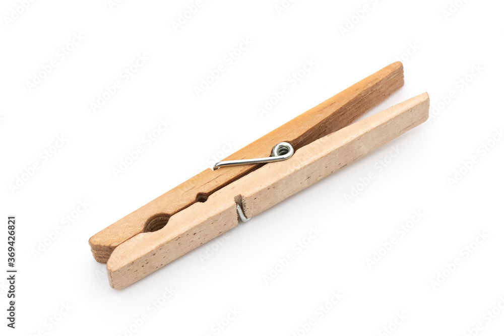 Wooden clothes pin on the white background. Wooden clothes pin on the white background.