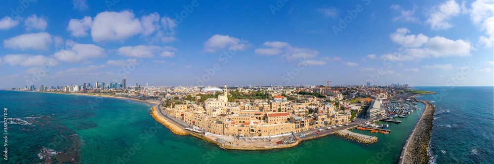 Aerial view of Jaffa old city port with marina coastline and general view of both Jaffa and Tel Aviv.

