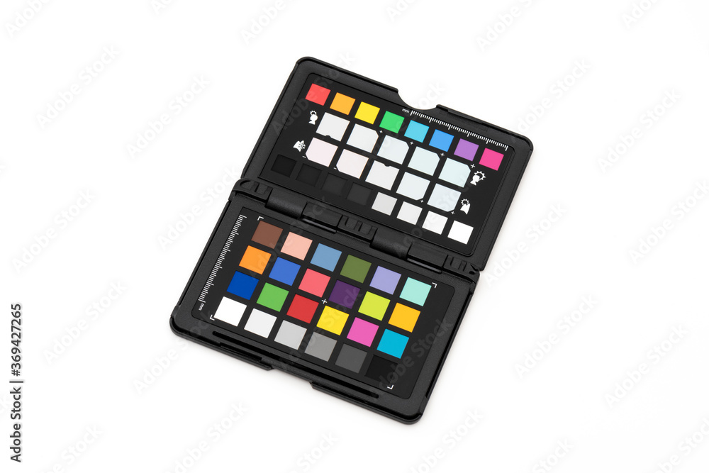 Close up view of color checker card equipment on the white background. Close up view of color checker card equipment on the white background.