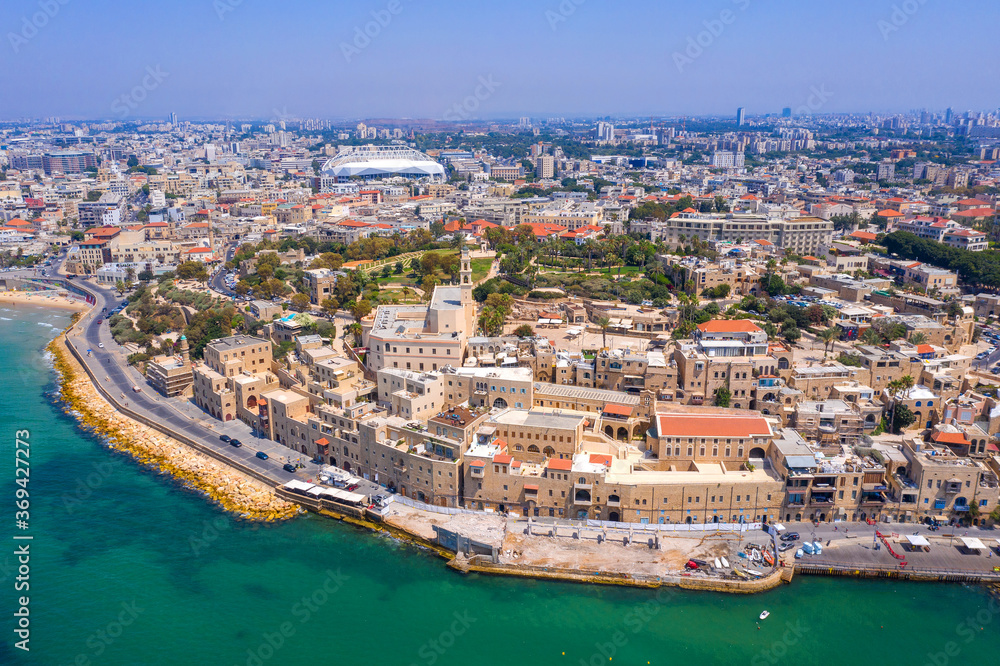 Aerial view of Jaffa old city port with marina coastline and general view of both Jaffa and Tel Aviv.
