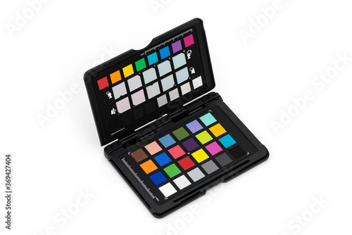 Close up view of color checker card equipment on the white background.
