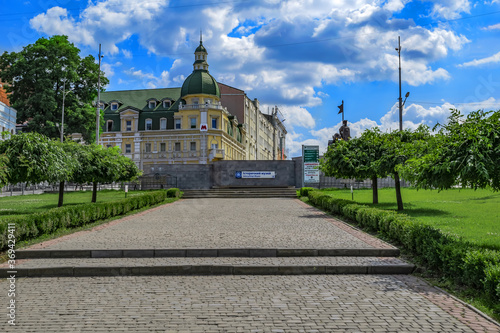 Kharkiv, Ukraine - July 20, 2020: Entrance to the subway on Bursatsky descent in Kharkov. Green park with a cobblestone road in the historical center of the Ukrainian city on a sunny summer day