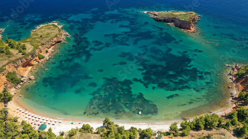 Aerial drone panoramic photo of paradise beaches in Kokinokastro with crystal clear turquoise sea, Alonissos island, Sporades, Greece 