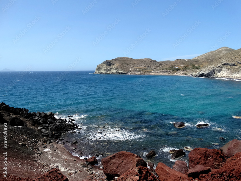 Natural landscape of Red Beach in Akrotiri on Santorini Island, Greece. Red Beach is famed for its titular red-hued sand, and is a noted for being popular tourist attraction. Natural landscape of Red Beach in Akrotiri on Santorini Island, Greece. Red Beach is famed for its titular red-hued sand, and is a noted for being popular tourist attraction.