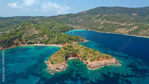 Aerial drone panoramic photo of paradise beaches in Kokinokastro with crystal clear turquoise sea, Alonissos island, Sporades, Greece © aerial-drone