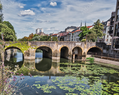 Metz, view on the riverside with beautiful old buildings photo