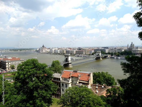 Panoramic view of Danube river and Pest cityscape from Buda Castle in Budapest, Hungary. Budapest is the capital city of Hungary and cross over Danube river.