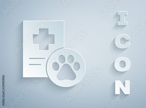 Paper cut Clipboard with medical clinical record pet icon isolated on grey background. Health insurance form. Medical check marks report. Paper art style. Vector.