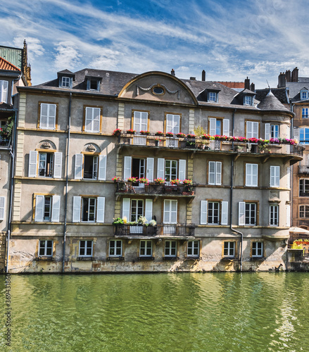 Metz, view on the riverside with beautiful old buildings