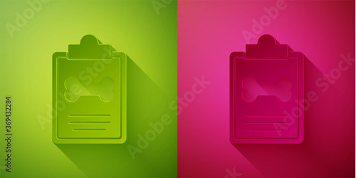 Paper cut Clipboard with medical clinical record pet icon isolated on green and pink background. Health insurance form. Medical check marks report. Paper art style. Vector.