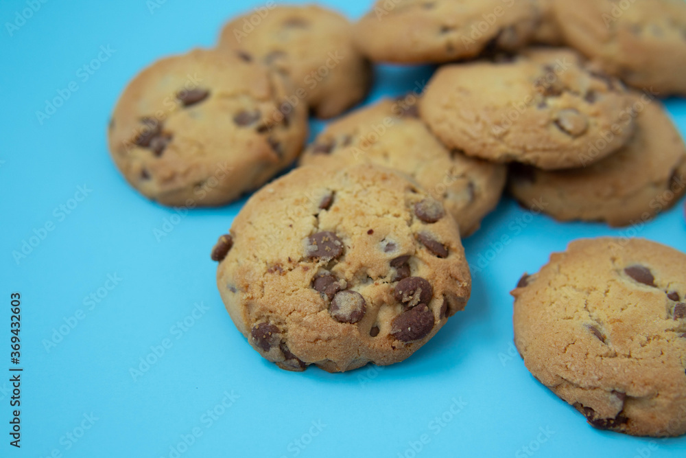 chocolate cookies on a blue background chocolate cookies on a blue background