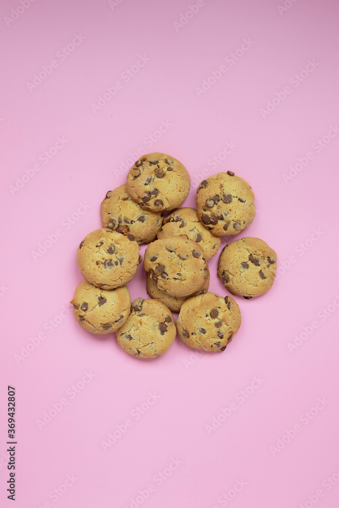 chocolate cookies on a pink background